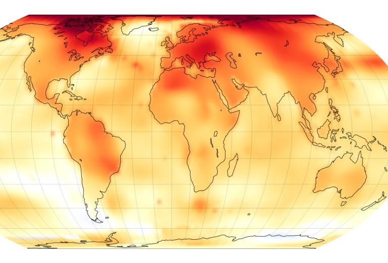 A map of the globe with many areas yellow, orange, and red, showing where surface temperatures were higher than 20th-century baselines.